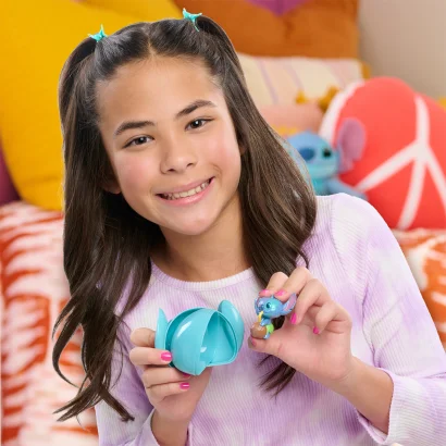 Фігурка-сюрприз у капсулі STITCH серії &quot;Feed Me&quot; - СТІЧ ЗІ СМАКОЛИКАМИ (в асорт., у диспл.)