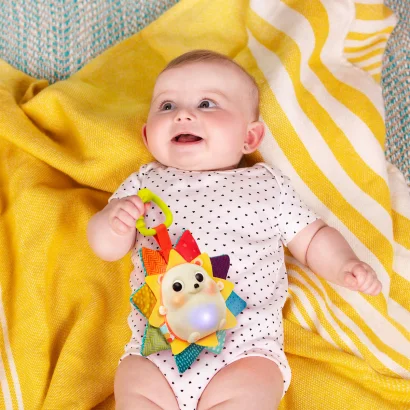 Сенсорна іграшка, що розвиває &ndash; ЇЖАЧОК СЯЙВО-ВЕСЕЛЯЙВО (світло, звук)